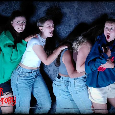 a group of people posing for the camera