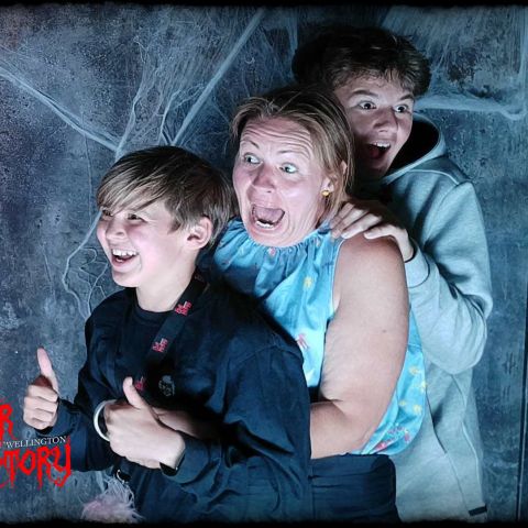 a young boy sitting on a bench