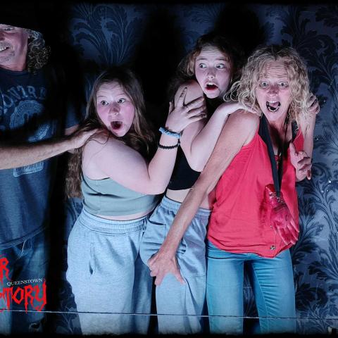 a group of people posing for the camera