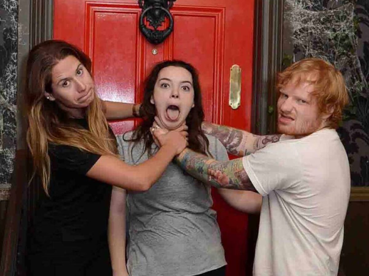 a man and a woman posing for a picture