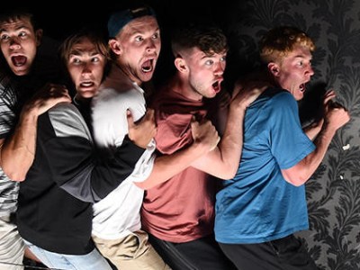 a group of people posing for the camera