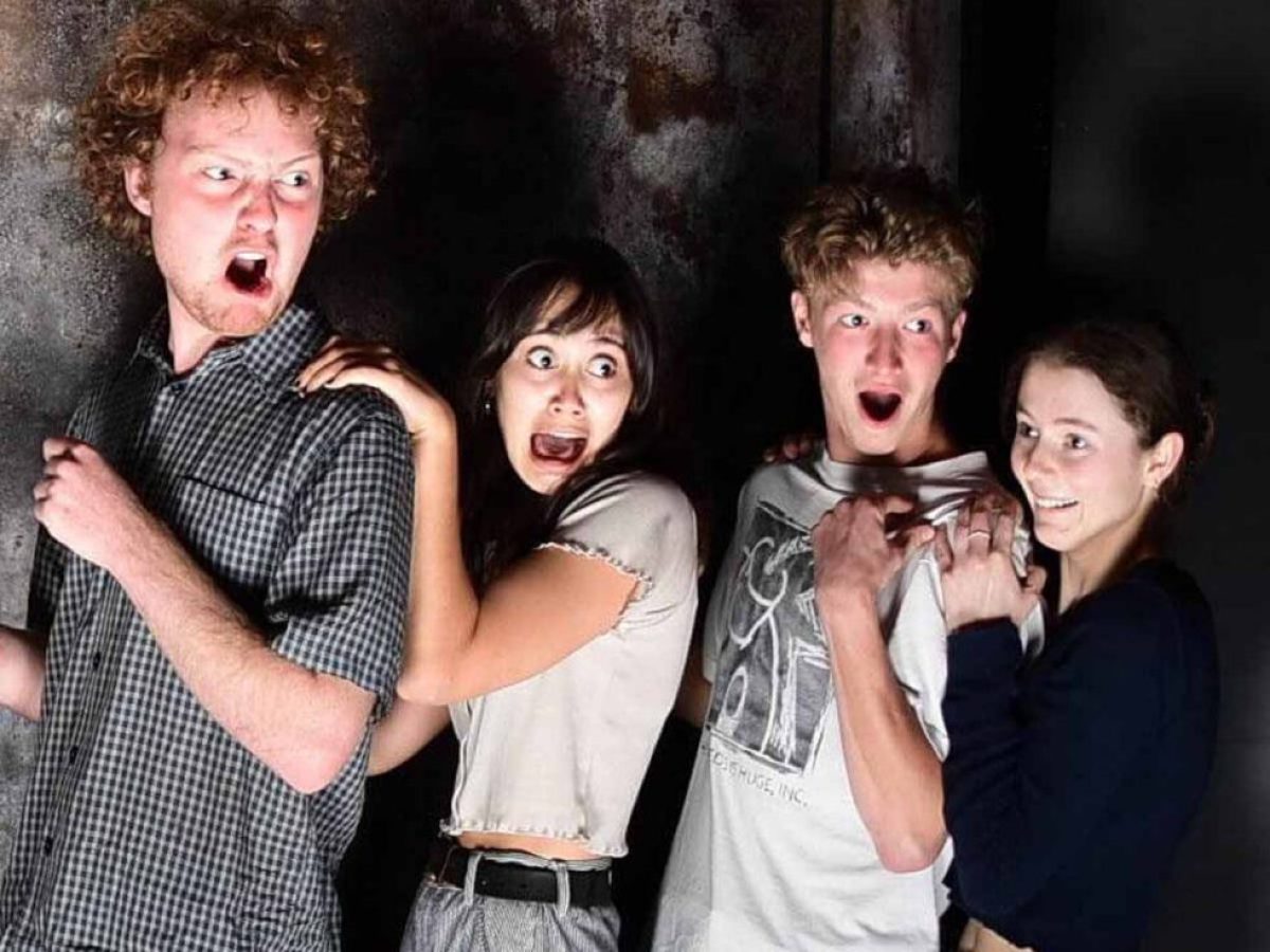 a group of people posing for the camera