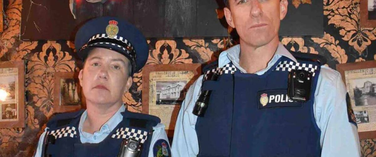 a couple of people that are standing together in uniform