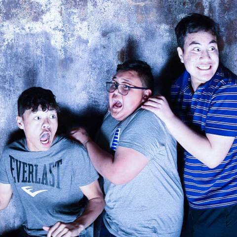 a group of people posing for the camera