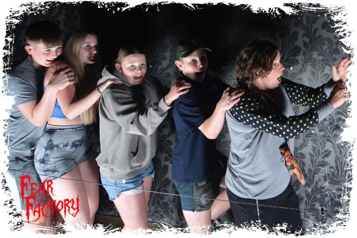 a group of people posing for the camera